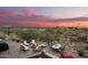 Elevated view of backyard patio, fire pit, dining area and hot tub at 16548 E Emerald Dr, Fountain Hills, AZ 85268