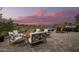 Backyard patio with hot tub, seating and sunset views at 16548 E Emerald Dr, Fountain Hills, AZ 85268