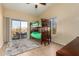 Bedroom with bunk bed, patio access, and mountain view at 16548 E Emerald Dr, Fountain Hills, AZ 85268