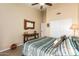 Guest bedroom with rustic wooden furniture and a view at 16548 E Emerald Dr, Fountain Hills, AZ 85268