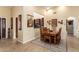 Bright dining room with wood table and kitchen view at 16548 E Emerald Dr, Fountain Hills, AZ 85268