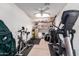 Home exercise room with elliptical, stationary bike, and weights at 16548 E Emerald Dr, Fountain Hills, AZ 85268