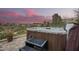 Relax in this luxurious hot tub, enjoying scenic sunset views at 16548 E Emerald Dr, Fountain Hills, AZ 85268