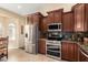 Well-equipped kitchen with granite countertops at 16548 E Emerald Dr, Fountain Hills, AZ 85268