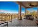 Covered patio with seating area and mountain views at 16548 E Emerald Dr, Fountain Hills, AZ 85268