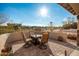 Sunny patio with fire pit and seating area, enjoying scenic views at 16548 E Emerald Dr, Fountain Hills, AZ 85268