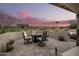 Charming patio with fire pit and seating, perfect for outdoor enjoyment at 16548 E Emerald Dr, Fountain Hills, AZ 85268