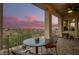 Covered patio with stunning sunset views and mountain backdrop at 16548 E Emerald Dr, Fountain Hills, AZ 85268