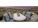 Spacious patio with outdoor dining and sunset views at 16548 E Emerald Dr, Fountain Hills, AZ 85268