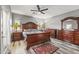 Spacious bedroom with wood furniture and ceiling fan at 17216 E Salida Dr # B, Fountain Hills, AZ 85268