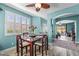 Charming dining area with wooden table and view of kitchen at 17216 E Salida Dr # B, Fountain Hills, AZ 85268