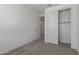 This bedroom features carpet and closet with sliding doors at 18225 W Hess St, Goodyear, AZ 85338