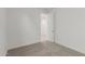 Neutral bedroom with a carpeted floor and white walls provides a peaceful and versatile space at 18225 W Hess St, Goodyear, AZ 85338