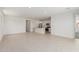 Open-concept living area connecting to the kitchen featuring recessed lighting at 18225 W Hess St, Goodyear, AZ 85338