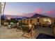 Spacious backyard with patio, fire pit and seating at 18258 W Spencer Dr, Surprise, AZ 85374