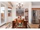 Cozy dining area with a wood table and chairs, near kitchen at 18258 W Spencer Dr, Surprise, AZ 85374