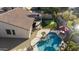 Stunning aerial view showcasing the home's backyard, pool, and putting green at 1893 E San Carlos Pl, Chandler, AZ 85249