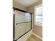 Bathroom with shower/tub combo and textured glass sliding door at 1893 E San Carlos Pl, Chandler, AZ 85249