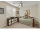 Bright bedroom with daybed, window shutters, and decorative wall art at 1893 E San Carlos Pl, Chandler, AZ 85249