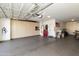 Spacious garage with ample storage cabinets and workspace at 1893 E San Carlos Pl, Chandler, AZ 85249