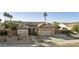 Front view of the house with a two-car garage and walkway at 1893 E San Carlos Pl, Chandler, AZ 85249