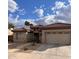 Front view of charming house with two-car garage at 1893 E San Carlos Pl, Chandler, AZ 85249