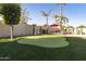 Enjoy your own private putting green in the backyard at 1893 E San Carlos Pl, Chandler, AZ 85249