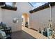 Bright and airy courtyard with a walkway and metal art at 19027 N 269Th Dr, Buckeye, AZ 85396