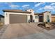 Spacious home with a large driveway and well-manicured landscaping at 19027 N 269Th Dr, Buckeye, AZ 85396