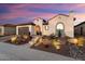 Spanish-style home with a charming courtyard and a welcoming entrance at 19027 N 269Th Dr, Buckeye, AZ 85396