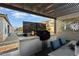 Outdoor kitchen with grill and pergola covered patio at 19027 N 269Th Dr, Buckeye, AZ 85396