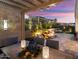 Outdoor dining area on patio with pergola and view of backyard landscape at 19027 N 269Th Dr, Buckeye, AZ 85396