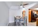 Dining area with gray chairs and a dark wood table at 1905 E University Dr # 207, Tempe, AZ 85288