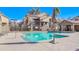 Community pool and building exterior view at 1905 E University Dr # 207, Tempe, AZ 85288