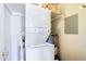 Stackable washer and dryer in a small laundry closet at 1905 E University Dr # 207, Tempe, AZ 85288