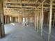 New home interior under construction, showing multiple rooms in various stages at 22844 E Lords Way, Queen Creek, AZ 85142