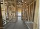 New home framing, showing bathroom and hallway areas under construction at 22844 E Lords Way, Queen Creek, AZ 85142