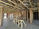 New home kitchen under construction, showing framing and plumbing at 22844 E Lords Way, Queen Creek, AZ 85142