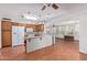 Kitchen with wood cabinets, tile floors, and island at 2407 W Laurel Ln, Phoenix, AZ 85029