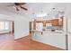 Kitchen features wood cabinets, tile flooring and island at 2407 W Laurel Ln, Phoenix, AZ 85029