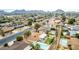 Wide aerial view of the home, neighborhood, and mountains at 2816 E Cholla St, Phoenix, AZ 85028