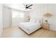 Bright bedroom with a king-size bed and wood nightstands at 2816 E Cholla St, Phoenix, AZ 85028