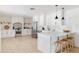 Modern white kitchen featuring stainless steel appliances and a large island at 2816 E Cholla St, Phoenix, AZ 85028