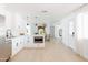 Modern white kitchen with stainless steel appliances and an island at 2816 E Cholla St, Phoenix, AZ 85028