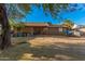 Backyard with house, tree, and boat at 2817 W Marshall Ave, Phoenix, AZ 85017