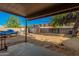 Large backyard with covered patio, storage shed and space for recreation at 2817 W Marshall Ave, Phoenix, AZ 85017