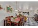 Dining area with a square table and kitchen access at 2817 W Marshall Ave, Phoenix, AZ 85017