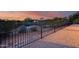 Landscaped backyard with a metal fence and gravel at 28370 N 113Th Way, Scottsdale, AZ 85262