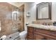 Bathroom with shower, toilet and granite vanity at 28370 N 113Th Way, Scottsdale, AZ 85262