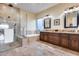 Elegant bathroom with double vanity, soaking tub, and walk-in shower at 28370 N 113Th Way, Scottsdale, AZ 85262